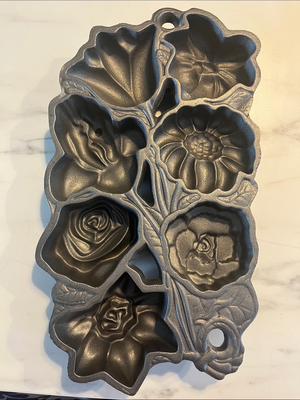 John Wright cast iron flowers